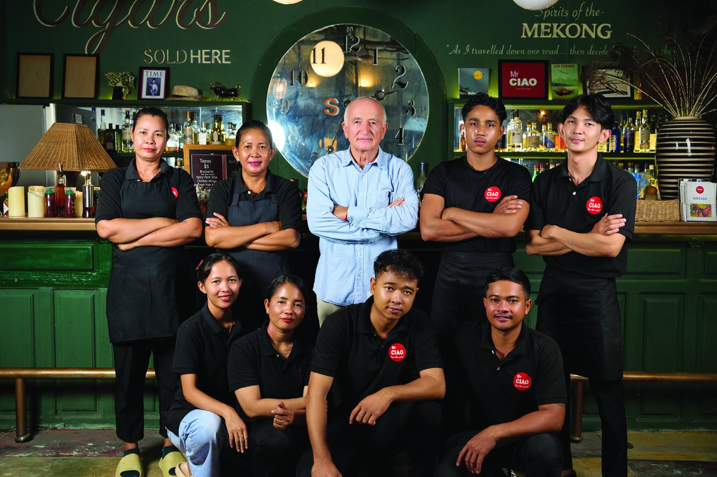 The Mr. CIAO team at the bar inside the restaurant